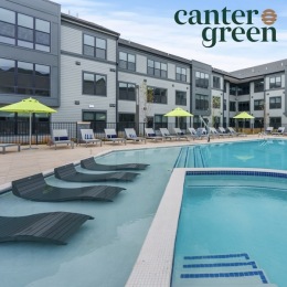 pool area showing reclining seating, wooden coverings and ample space